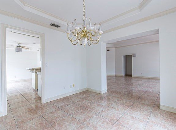 View from formal dinning looking into kitchen and