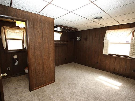 Convenient 14x13 First Floor Family Room or 1st Floor Master Bedroom and Powder Room