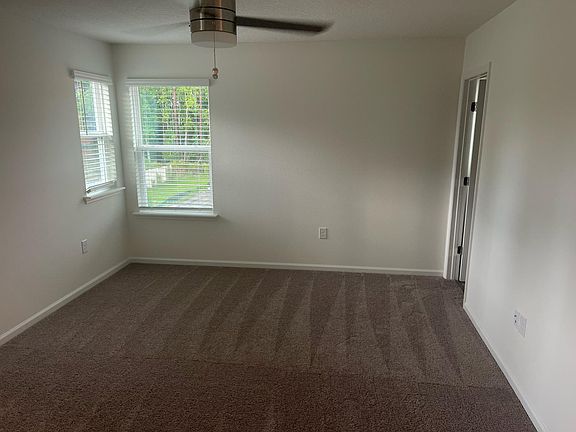 master bedroom and batch with 2 closets / wall to wall
