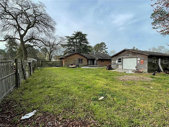Back yard, looking toward the home an detached garage
, aprox. 24X48 with power.
