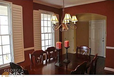 Dining room with large windows is very open and inviting