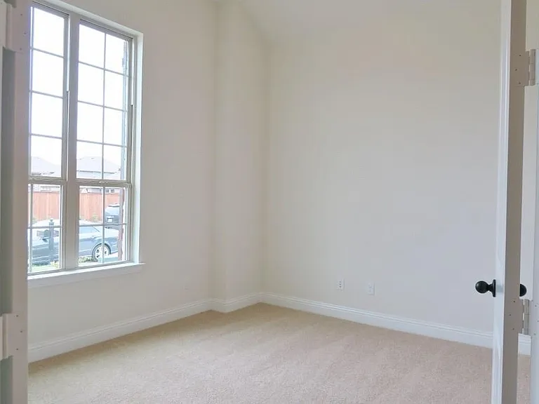 Study with double door and high ceiling