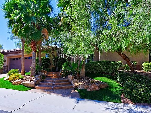 The entrance to this lovely home is thru a wrought iron security gate which is the entry to the cour