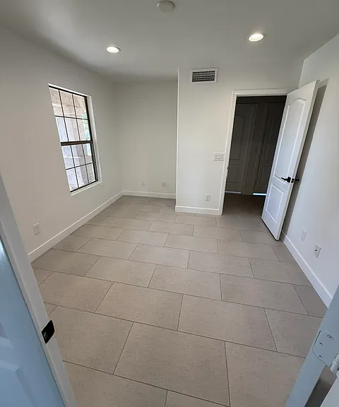 Dedicated office or 4th bedroom. Tons of lighting!