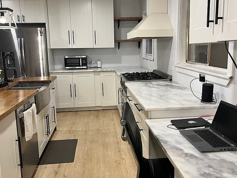 36" stove, all stainless appliances and small working nook