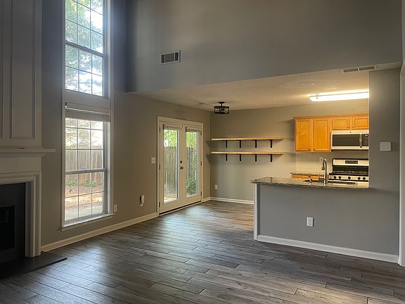 Open concept living, dining, and kitchen