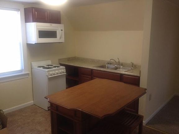 open kitchen and living room w/center island