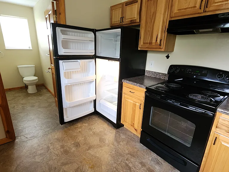 Refrigator, electric stove, bath room entrance