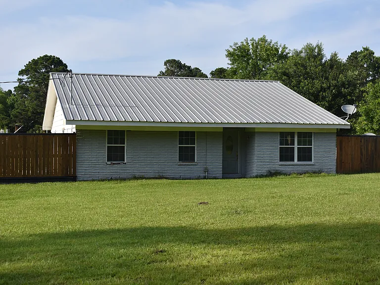 13925 Calhoun Rd — Photo 1