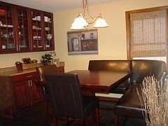 Kitchen opens to dining room with Built-in China Cabinets and Buffet