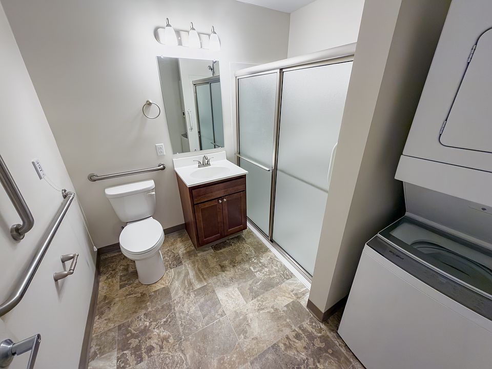 Designed for comfort and convenience with a step-in shower and in-unit laundry
