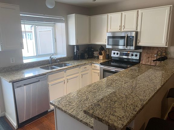 2nd image of 9661 W Chatfield Ave Unit B