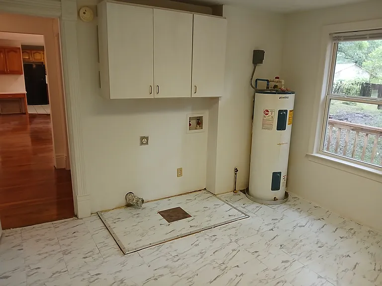 Utility Room With Wisher/Dryer Connections