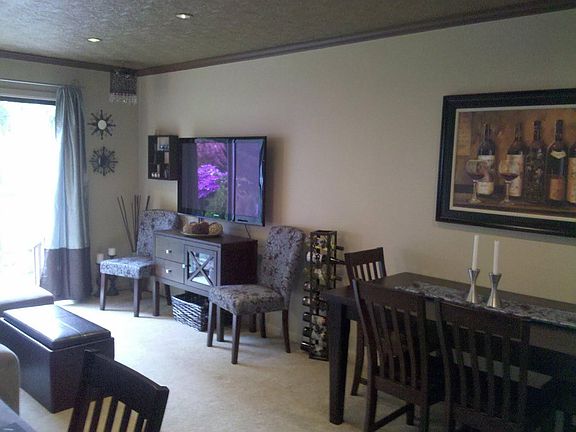 Living/dining room with access to outside patio.
