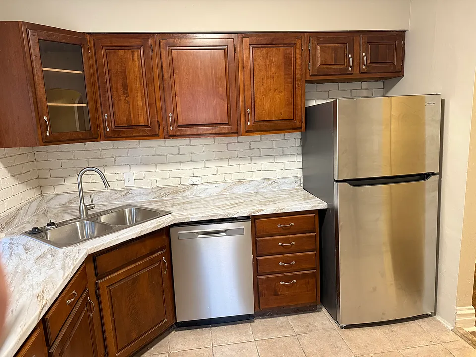 new fridge and dishwasher, sink and faucet, countertops