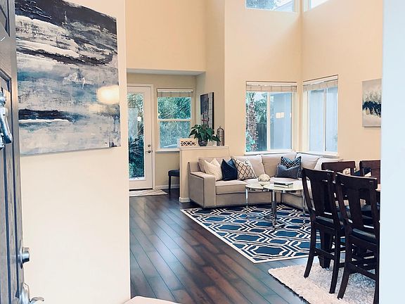 Living space as seen from entry to home. Home is available furnished.