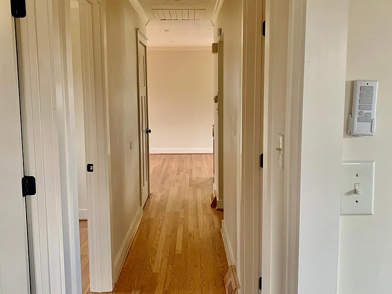 Hallway to bathroom and bedrooms