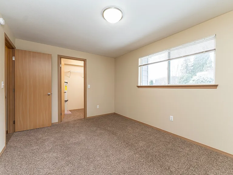 Experience the tranquility of this well-lit, spacious bedroom, perfect for your personal retreat. Experience the tranquility of this well-lit, spacious bedroom, perfect for your personal retreat.