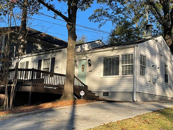 Large front porch overlooking quiet picturesque Brookhaven Street. Newly painted and pressure-washed exterior.