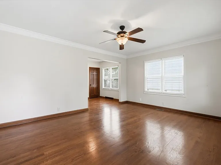 Hardwood floors, new trim, fresh paint on entire main floor. New window blinds on all windows.