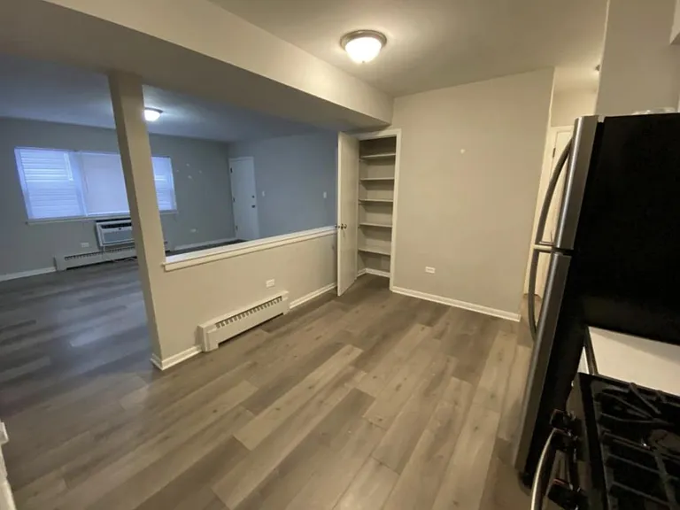 Kitchen View to Living Room and Pantry