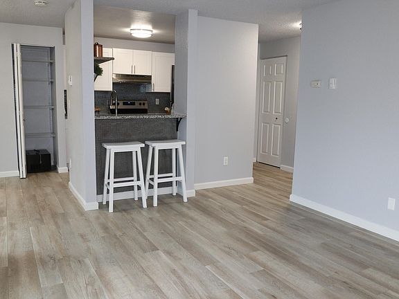 Open and bright space with fresh paint! Pantry with new shelves.