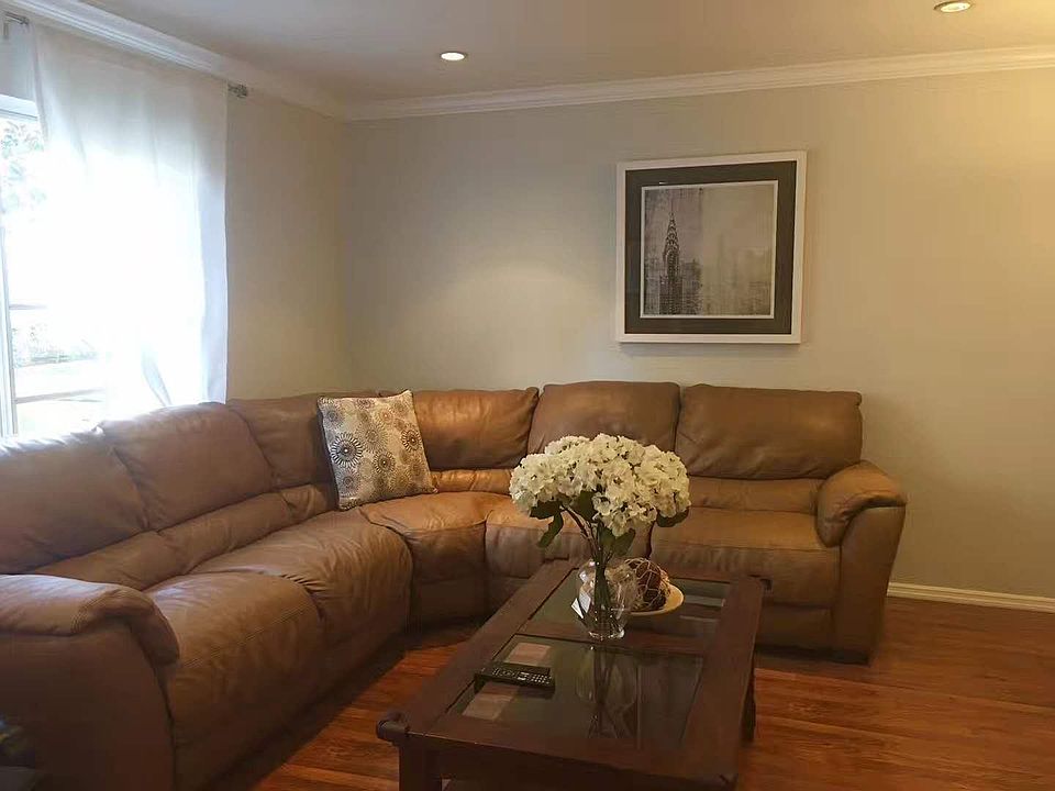 Spacious living room with oversized window