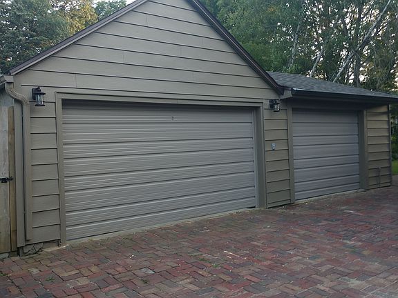 Triple stall garage with new overhead door 
