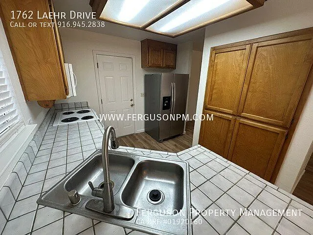 Three Bedroom Lincoln Home with New Paint and Flooring — Photo 3