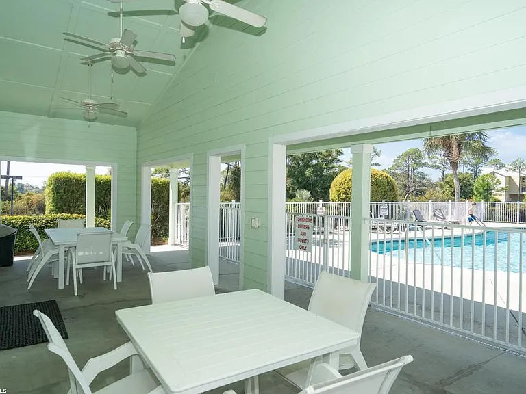 Shaded seating outside of the clubhouse offers a place for a quick snack and a break from the sun.
