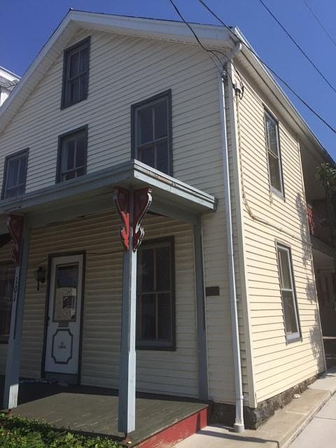 Great civil war house with big porch .