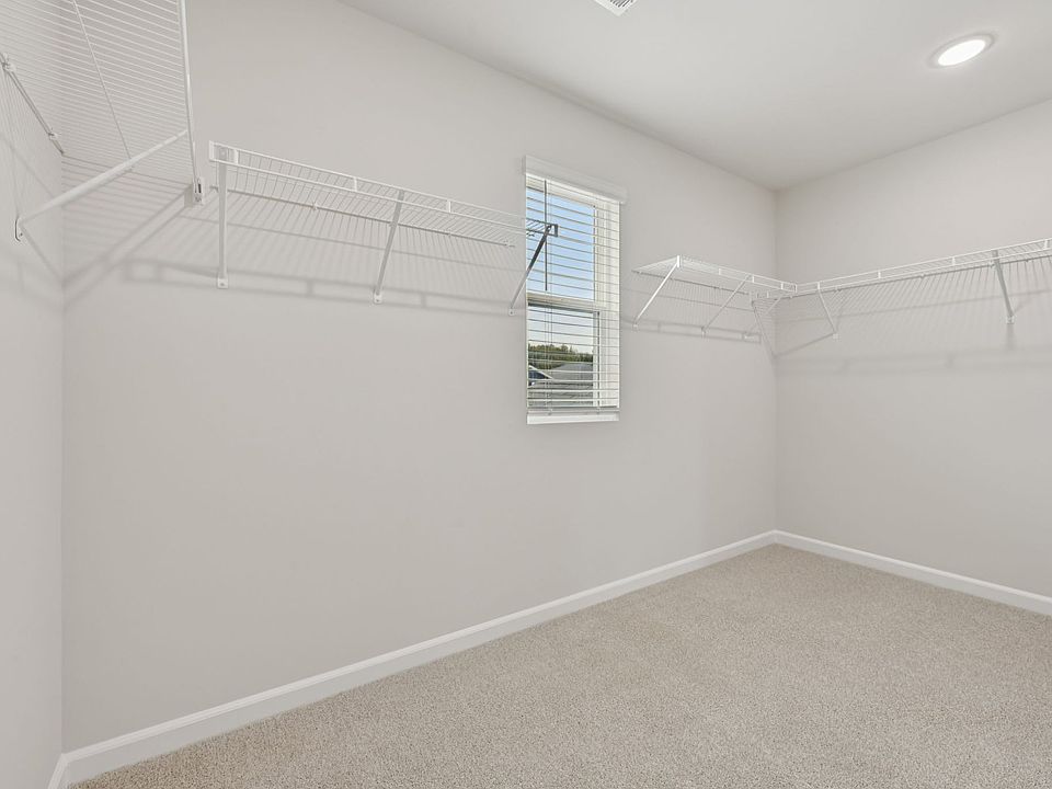 Walk-in closet in the Dakota floorplan at a Meritage Homes community in Garner, NC.