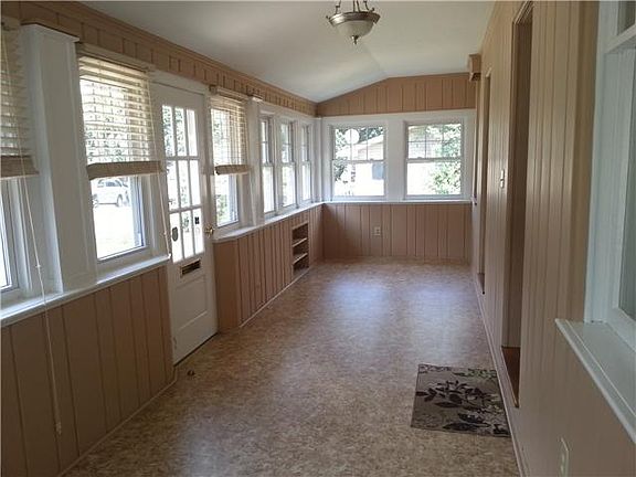 Beautiful Enclosed front porch.