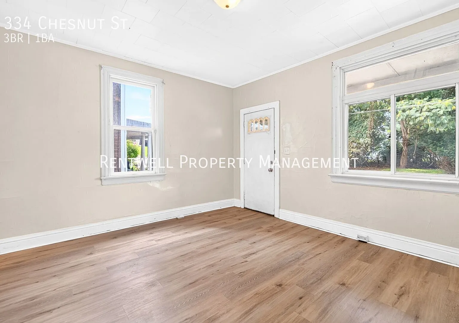 Spacious 3-Bedroom Home with Finished Basement & Wooded Views — Photo 4