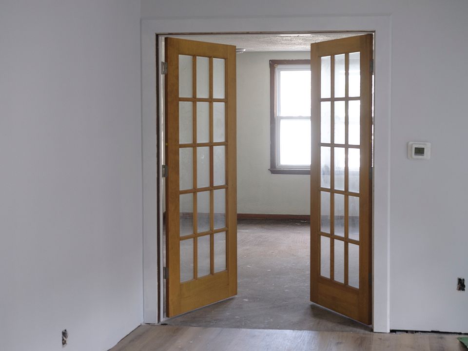 French doors into primary bedroom