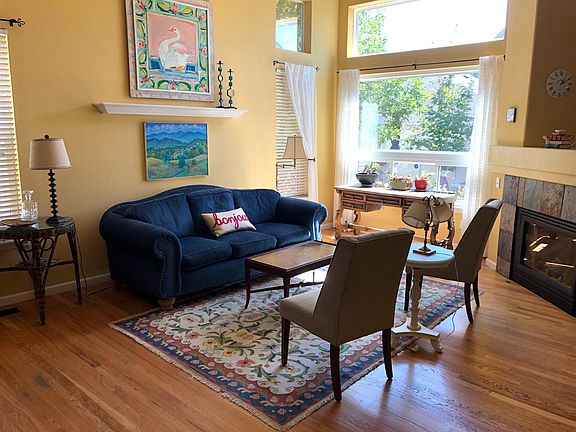 Living room with vaulted ceiling.