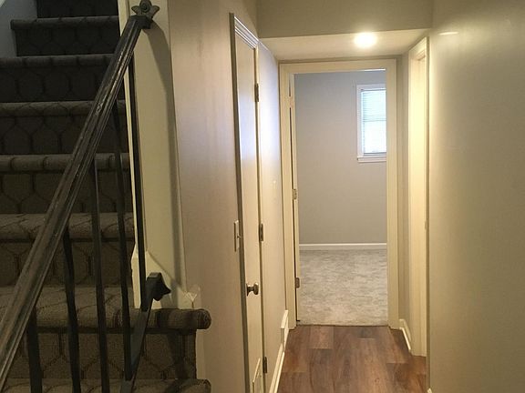 Lower level hall to Bedroom #2, Lower level full bath & hall closet.