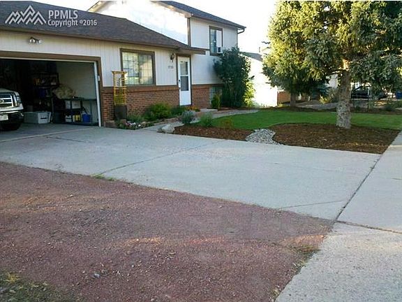 2 car garage, plus extra parking on property and on the street. Home is on corner of cul-de-sac.