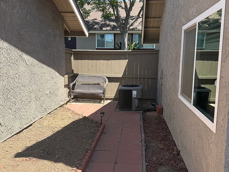 Private, gated patio area. Perfect for outdoor dining, lounging, and gardening.