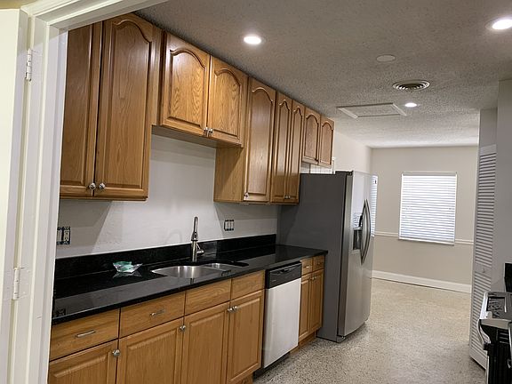 Stainless steel refrigerator and dishwasher