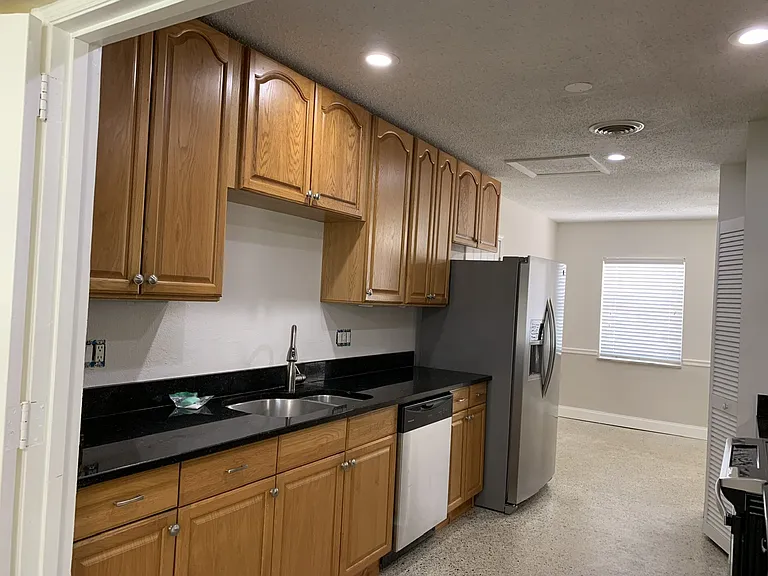 Stainless steel refrigerator and dishwasher