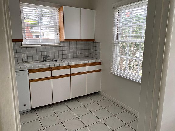 Kitchen with tile flooring