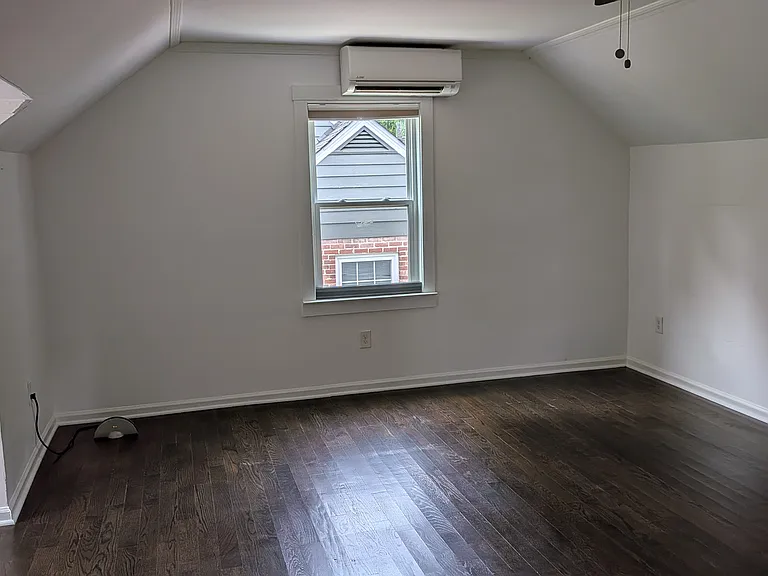 Upstairs main room with minisplit and bathroom