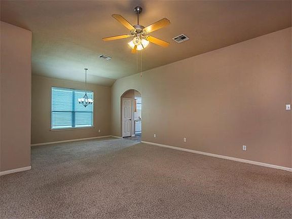 Living room, looking at the dining area.