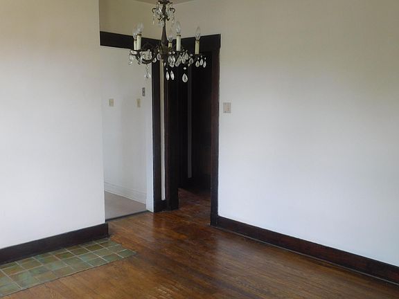 Dining room with chandelier.