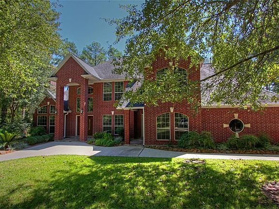 Home features 4 bedrooms, 4 full baths, swimming pool/spa, outdoor kitchen, guest quarters and backs to beautiful lake.