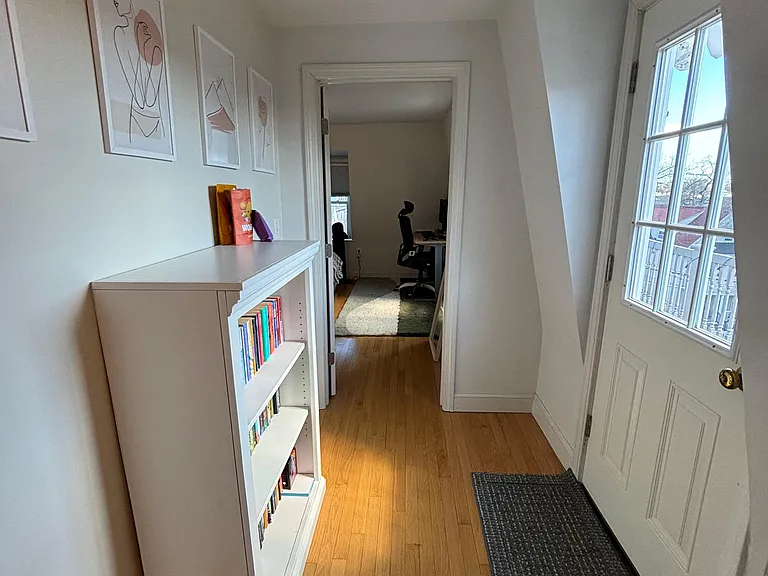Hall to bigger bedroom