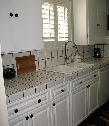 New cabinet fronts, plantation shutters