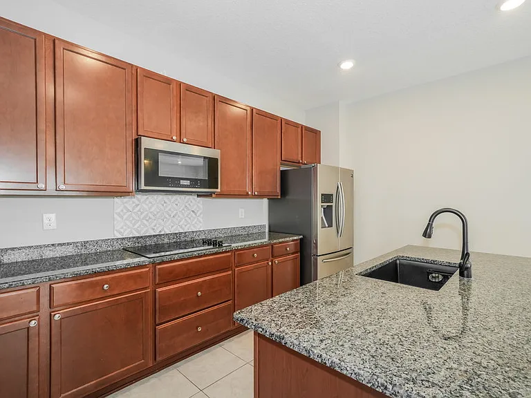 7729 Sunshine Bridge Ave — Photo 7