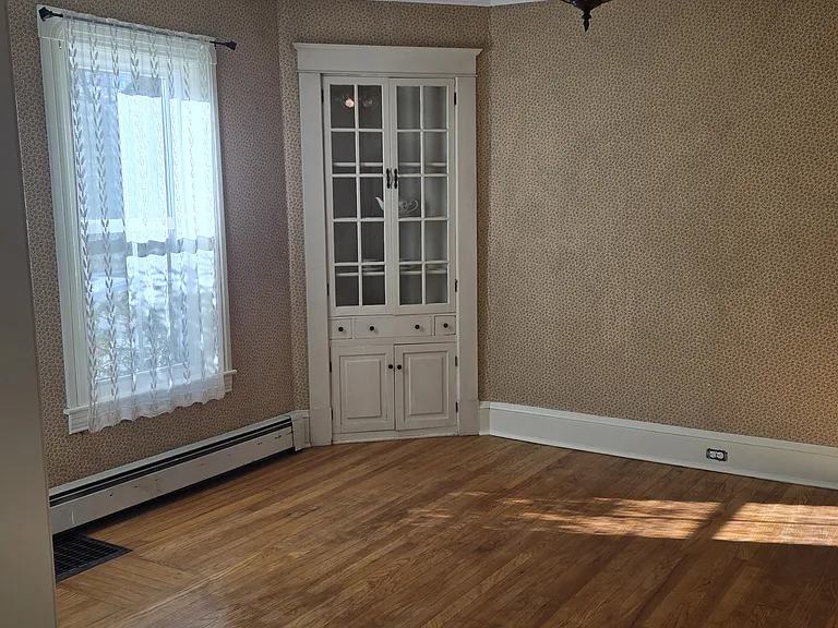 Dining Room with build in corner cabinet